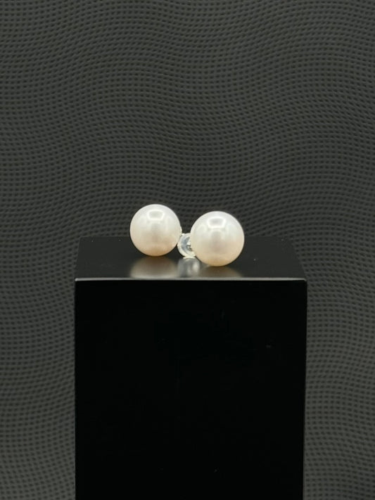 Cultured, South Sea, pearl earrings, exhibited on black box, white, stud style, extremely sharp, 12mm, 18k white gold.