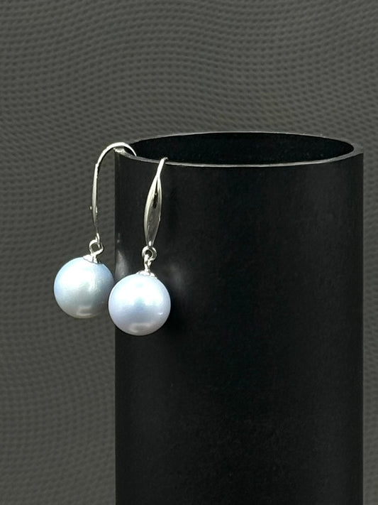 Cultured, South Sea, pearl earrings, exhibited on black cylinder, light blue, drop style, excellent reflection, 10-11mm, 18k white gold.