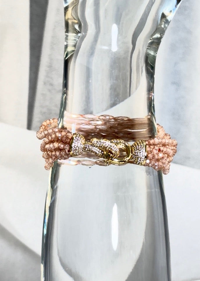 Decorative glass display, pink crystal inset hook clasp and beads