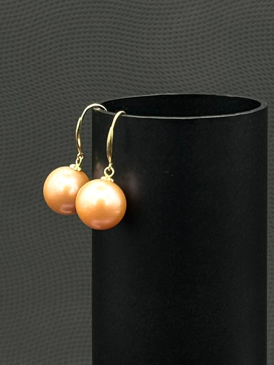 Cultured, South Sea Earrings, exhibited on black cylinder, pink, drop style, excellent reflection, 11-12mm,  18k yellow gold,