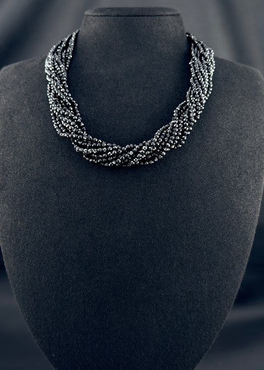 Genuine Stone, Black Spinel 10-strand necklace, exhibited on black suede, 2mm, 18", Silver-plated clasp with black crystal insets.