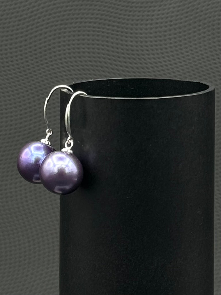 Cultured, Tahitian, pearl earrings, exhibited on black cylinder, purple, drop style, excellent reflection, 10-11mm, 18k white gold.