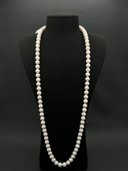 Cultured, South Sea, white continuous strand pearl necklace, exhibited on black suede, excellent reflection, 9-10.5mm, 35.5", 14k white gold clasp.