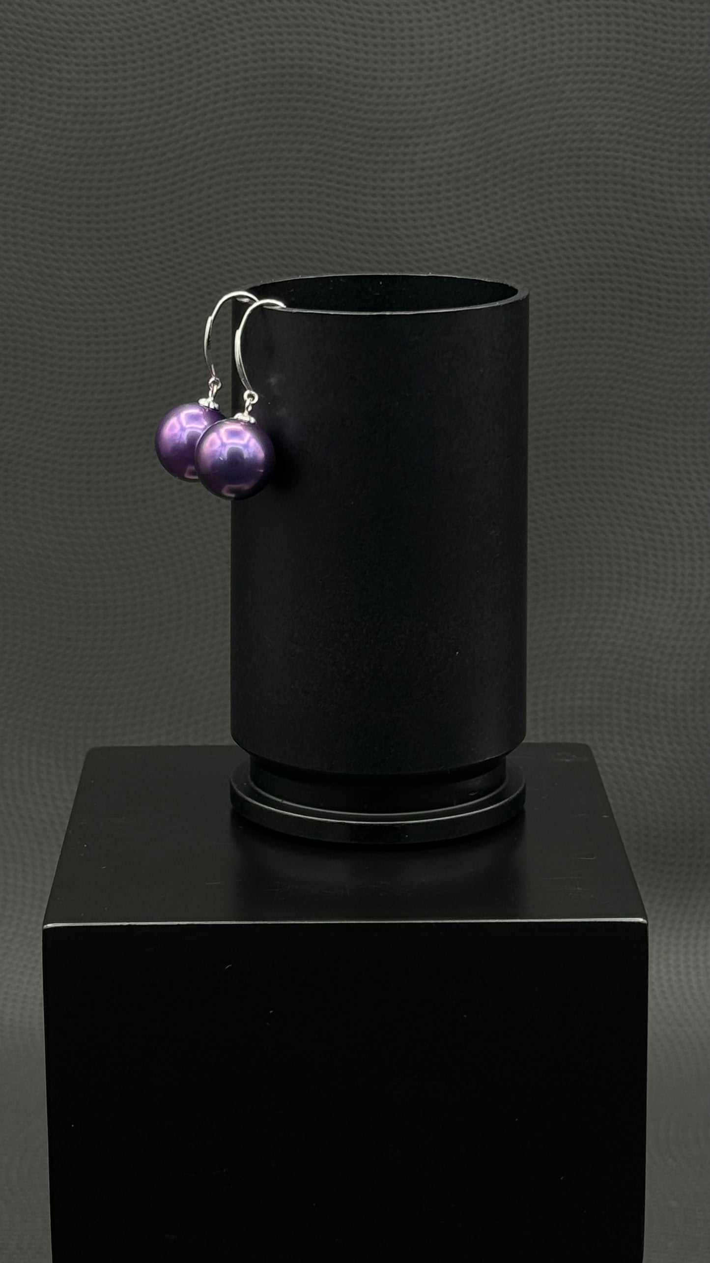 Cultured, Tahitian, pearl earrings, exhibited on black box, blue-purple, drop style, excellent reflection, 10-11mm, 18k white gold.