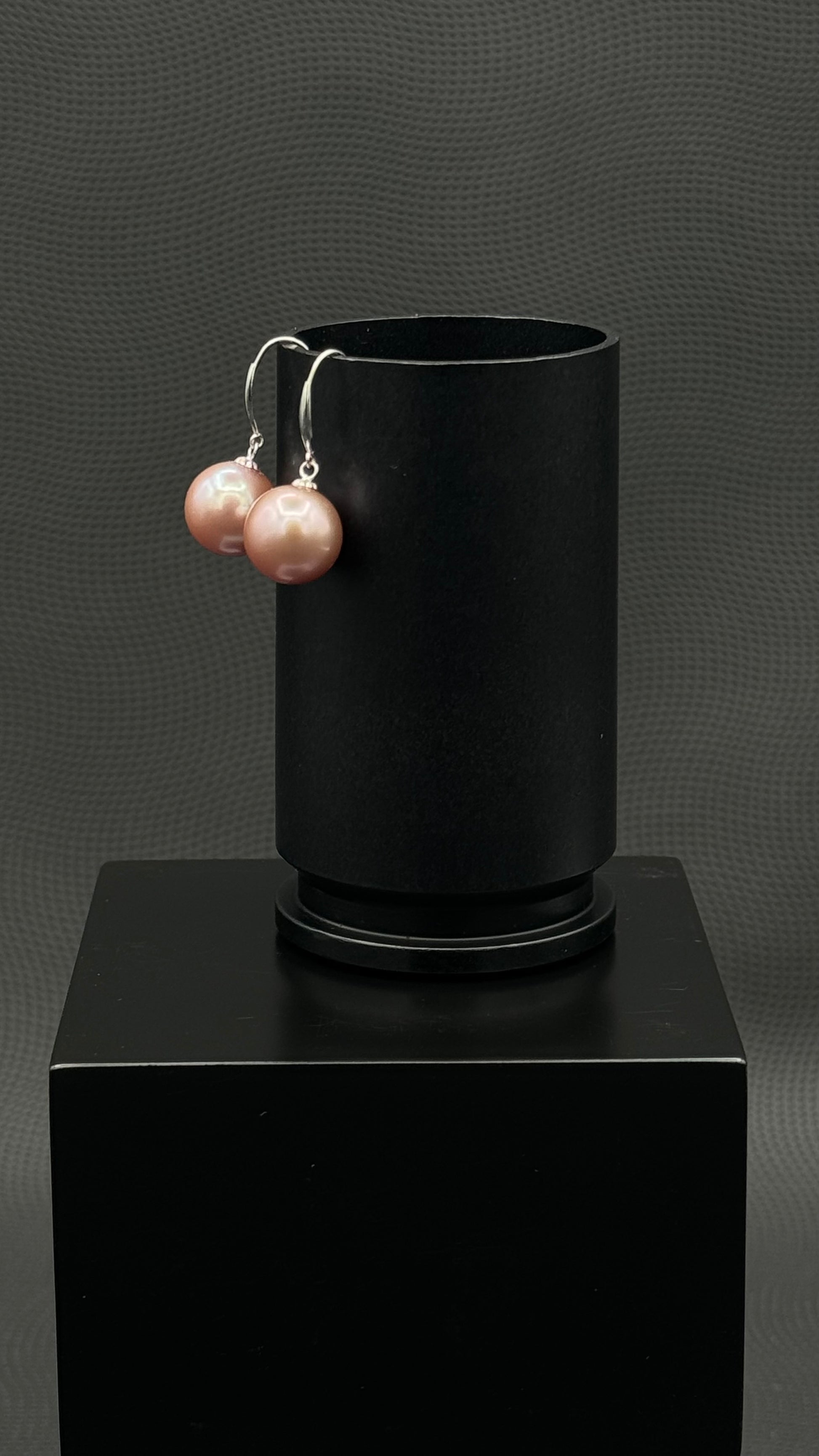 South Sea, Cultured, pearl earrings, exhibited on black box, drop style, light pink, excellent reflection, 11-12mm, 18k white gold,