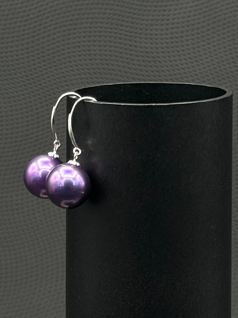 Cultured, Tahitian, pearl earrings, exhibited on black cylinder, blue-purple, drop style, excellent reflection, 10-11mm, 18k white gold.
