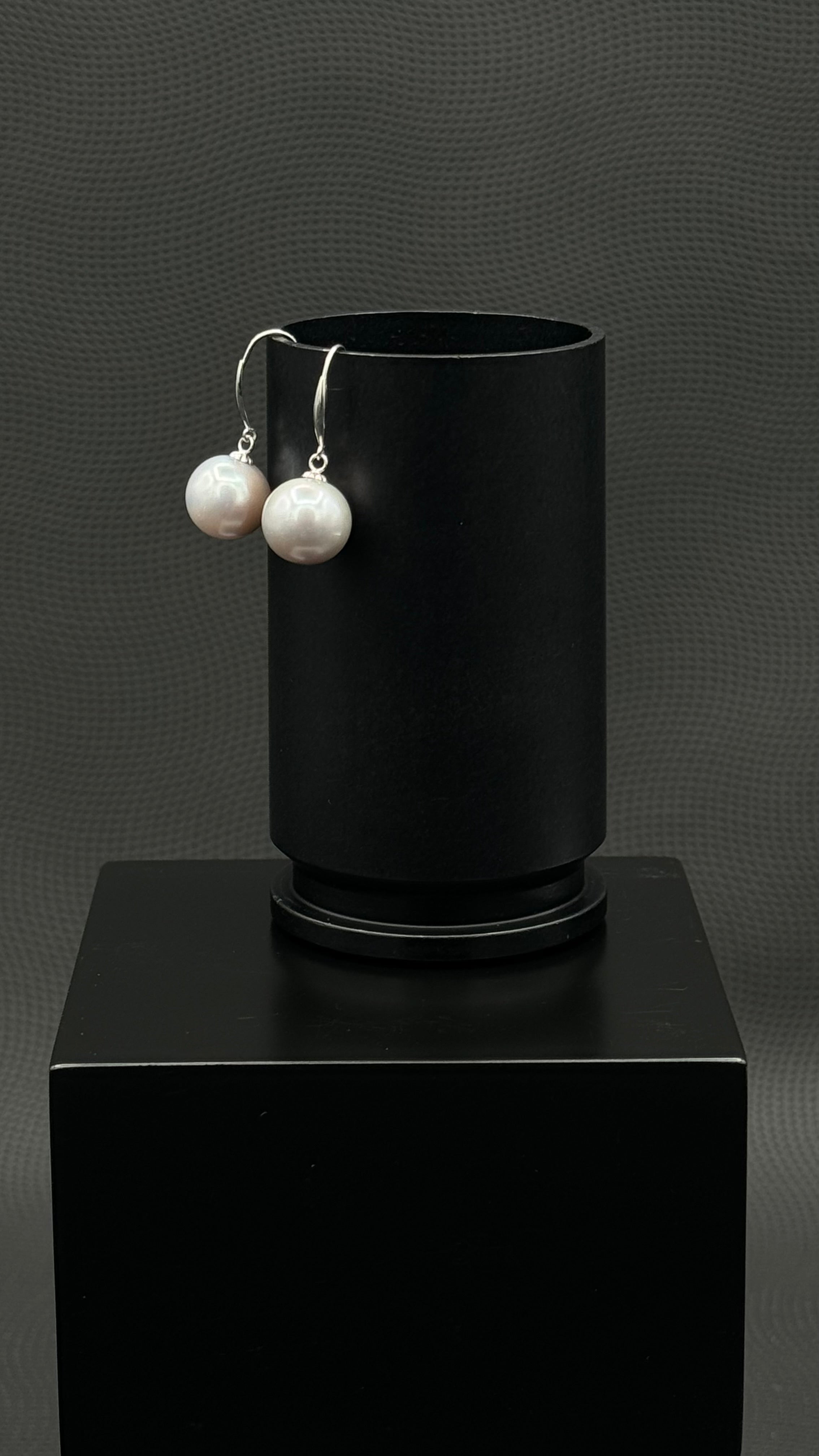 Cultured, South Sea, pearl earrings, exhibited on black box, light grey, drop style, 11-12mm, 18k white gold, 